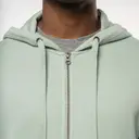 Ökologisches Sweatshirt aus French Terry mit Reißverschluss und Kapuze - Bild 4