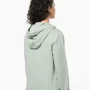 Ökologisches Sweatshirt aus French Terry mit Reißverschluss und Kapuze - Bild 8