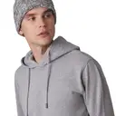Mütze mit Pompon und Umschlag - Bild 2