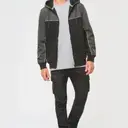 Bicolor fleece jack met capuchon en rits - Afbeelding 2