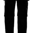 Trousers with floating pockets - Image 2