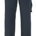 Trousers with thigh pockets - Image 1