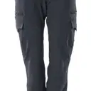 Trousers with thigh pockets - Image 1